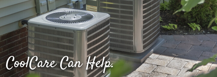 Two air conditioning units outside