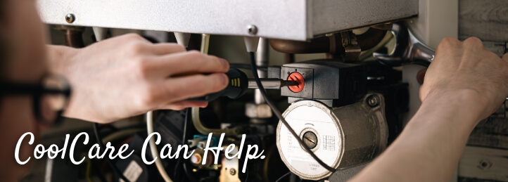 Person working on a heating system