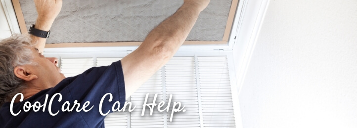 Man installing an air filter