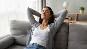 woman-enjoying-relaxing-in-house