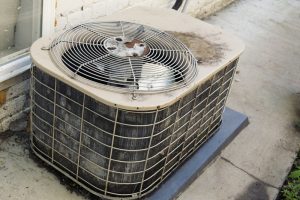 old-rusty-outdoor-unit-of-ac