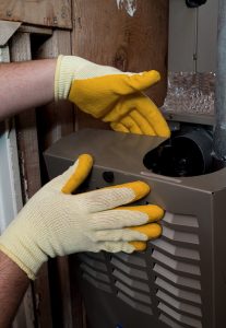 technician-hands-working-on-hvac-system