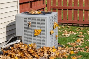 outdoor-AC-unit-with-autumn-leaves