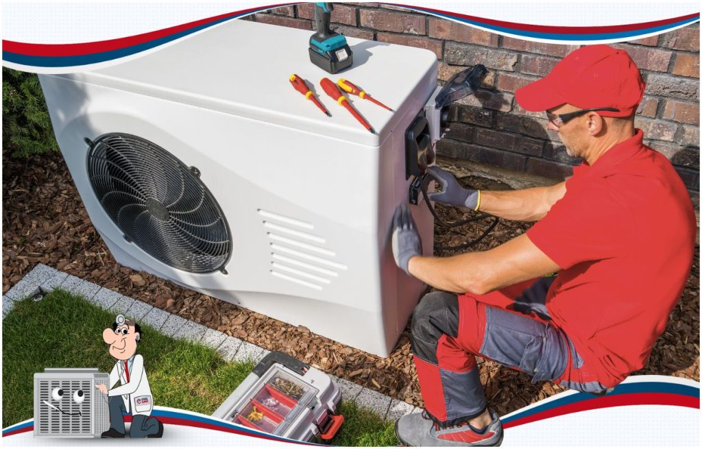 This is an image of a HVAC tech working on an AC Unit.